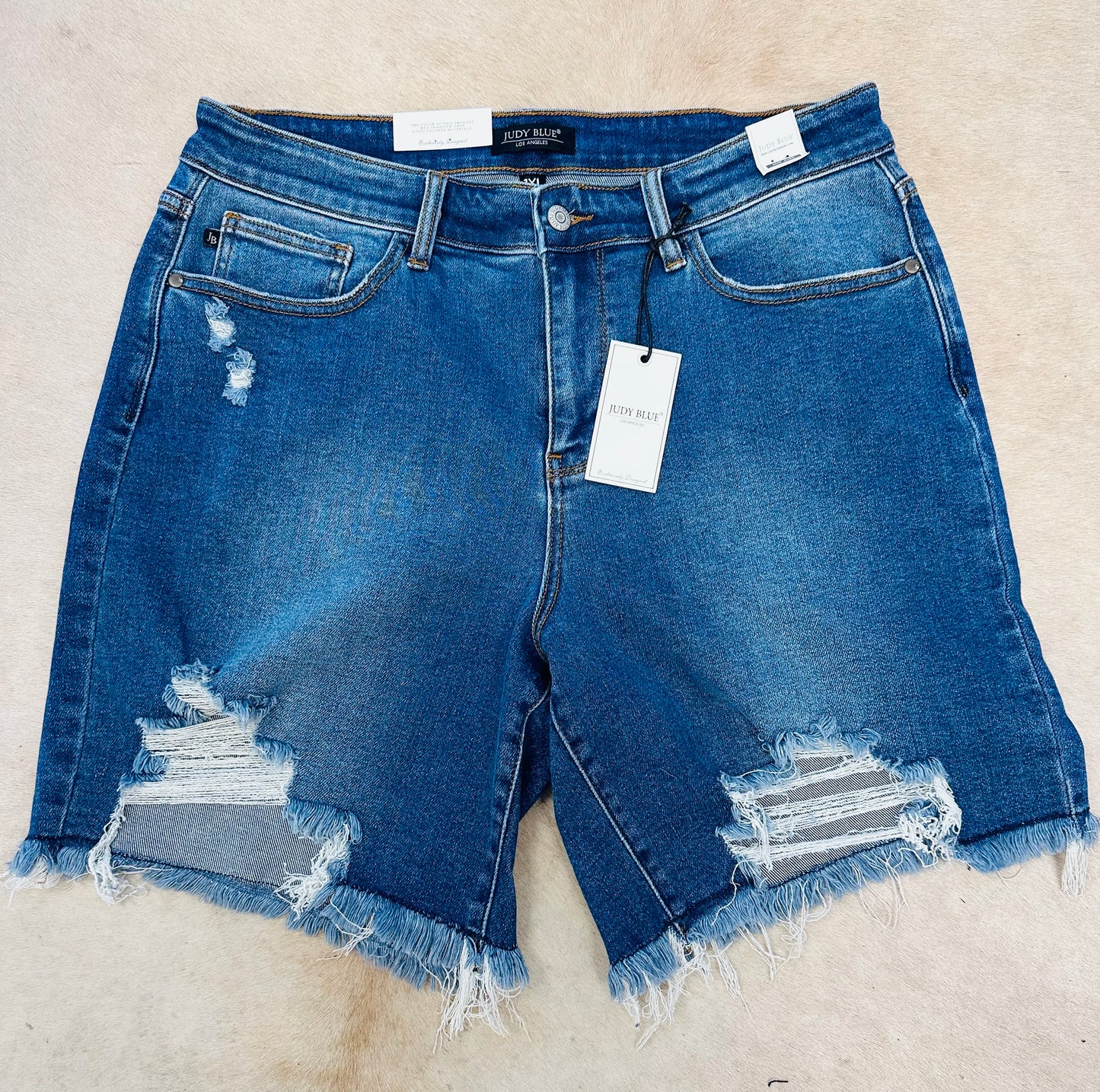 Distressed JB shorts